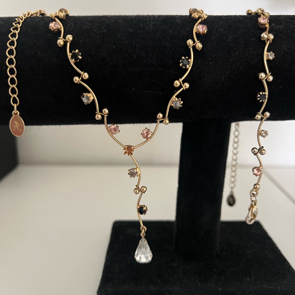 Gold Floral Vine Necklace And Bracelet Set With Pink, Black & Clear Stones